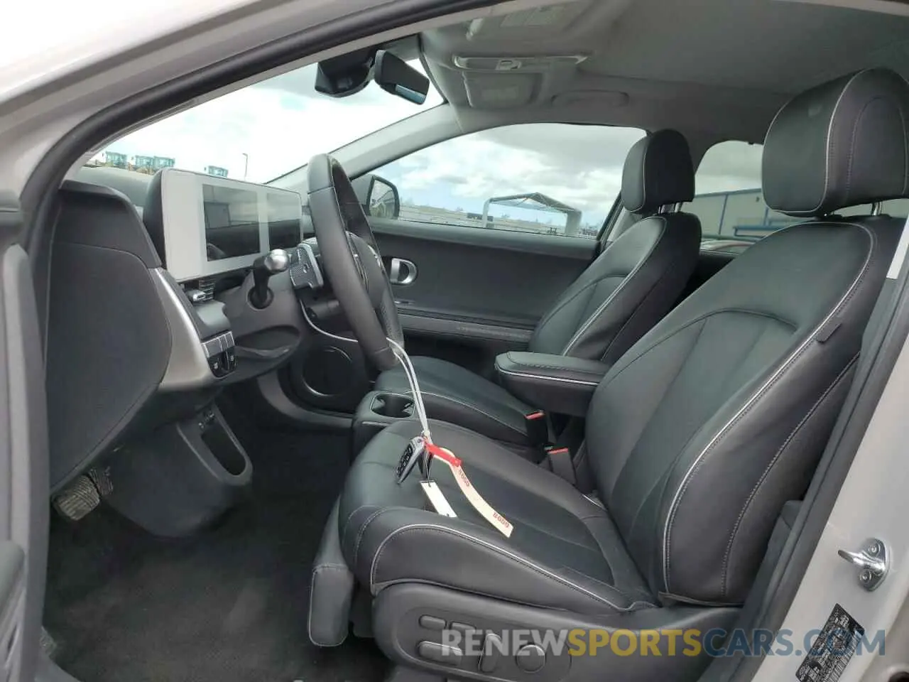 7 Photograph of a damaged car KM8KRDAF4PU157392 HYUNDAI IONIQ 2023