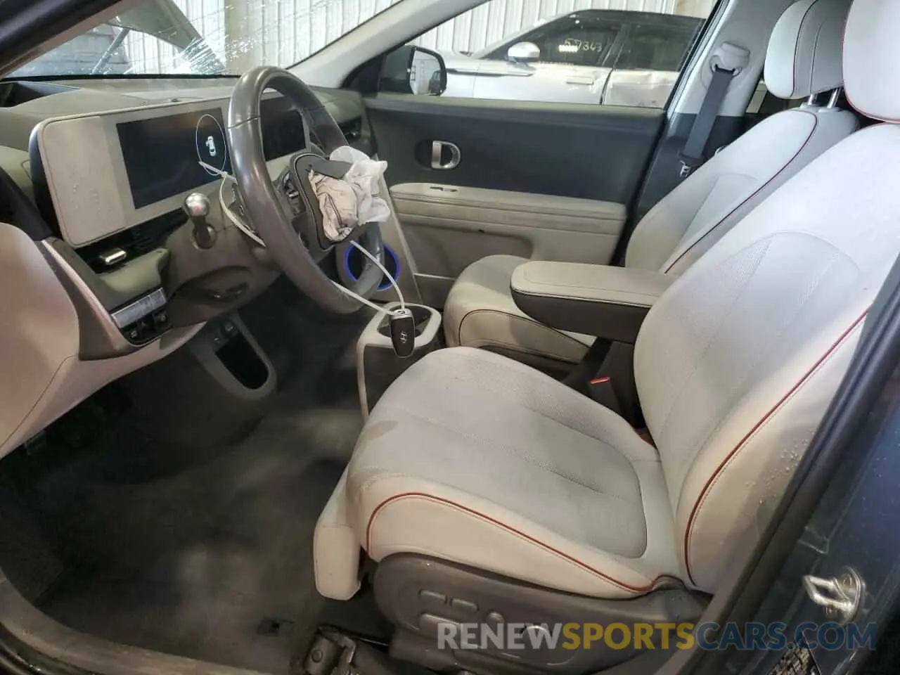 7 Photograph of a damaged car KM8KRDAF6PU127374 HYUNDAI IONIQ 2023