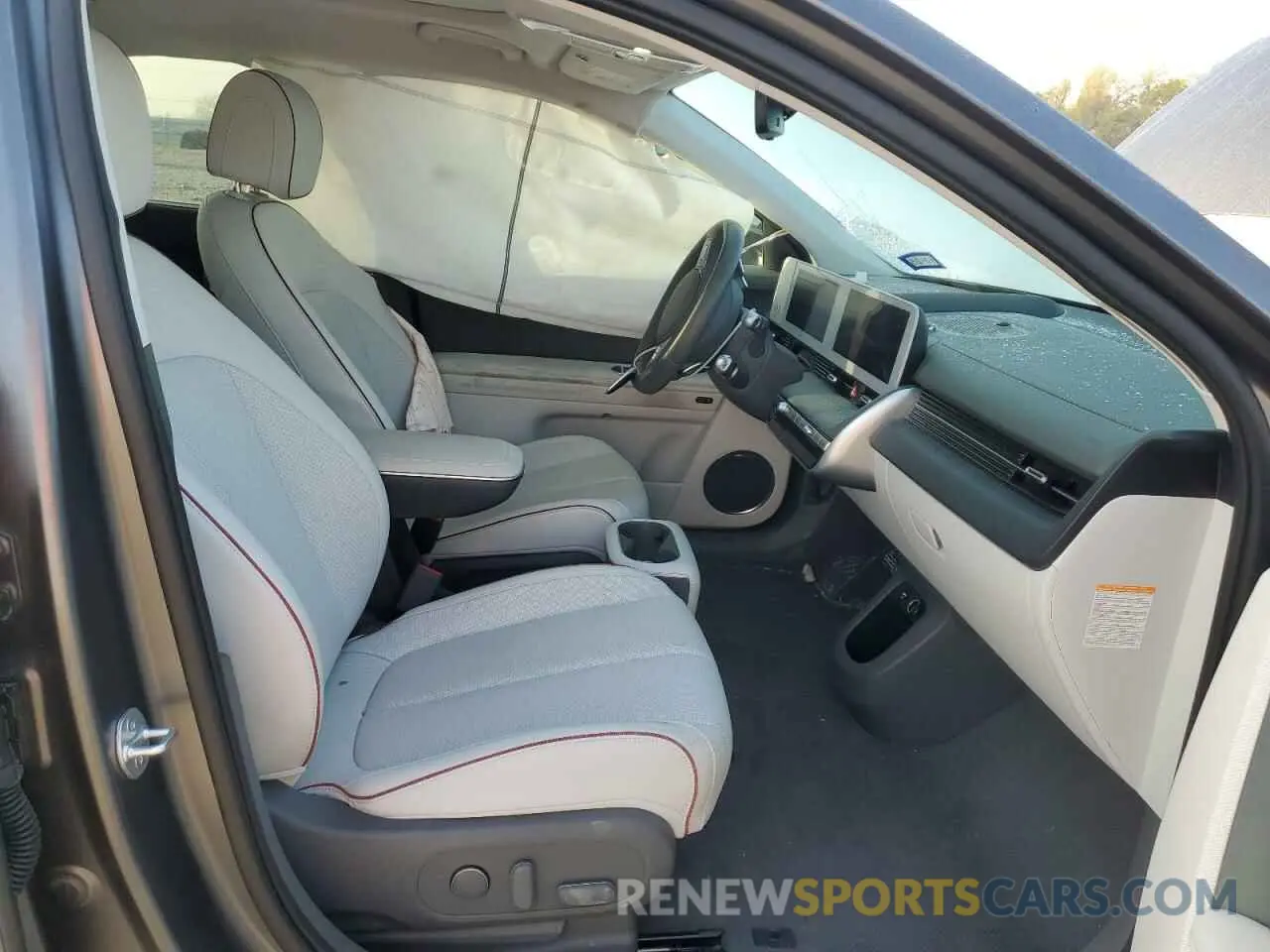 7 Photograph of a damaged car KM8KRDAF6PU218175 HYUNDAI IONIQ 2023