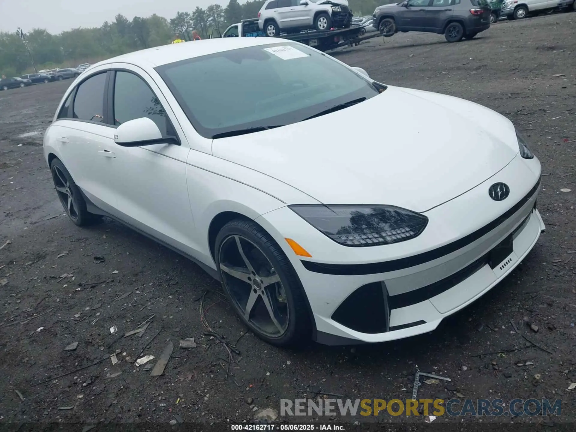 1 Photograph of a damaged car KMHM34AA8PA052368 HYUNDAI IONIQ 6 2023