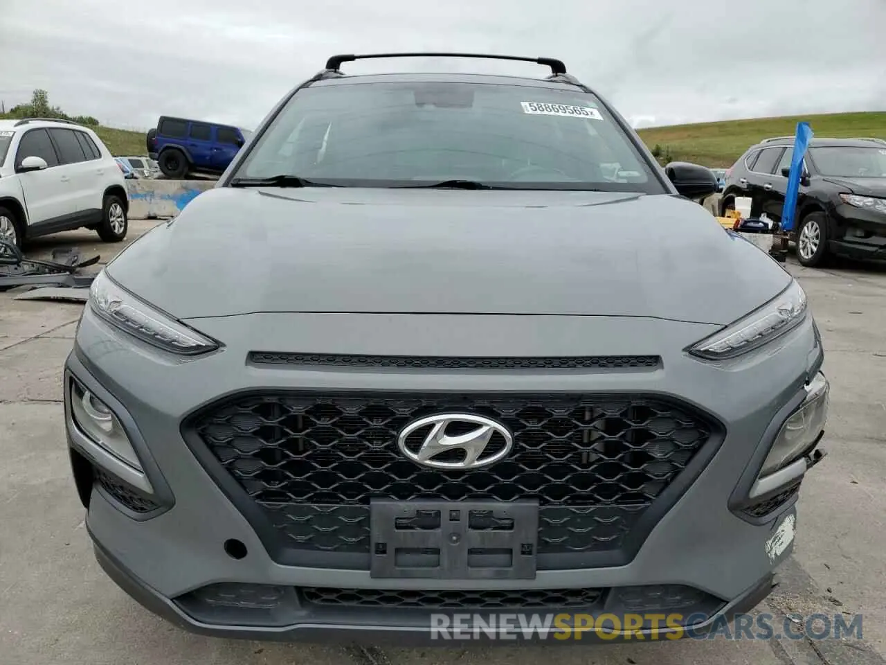 5 Photograph of a damaged car KM8K6CA5XMU675836 HYUNDAI KONA 2021