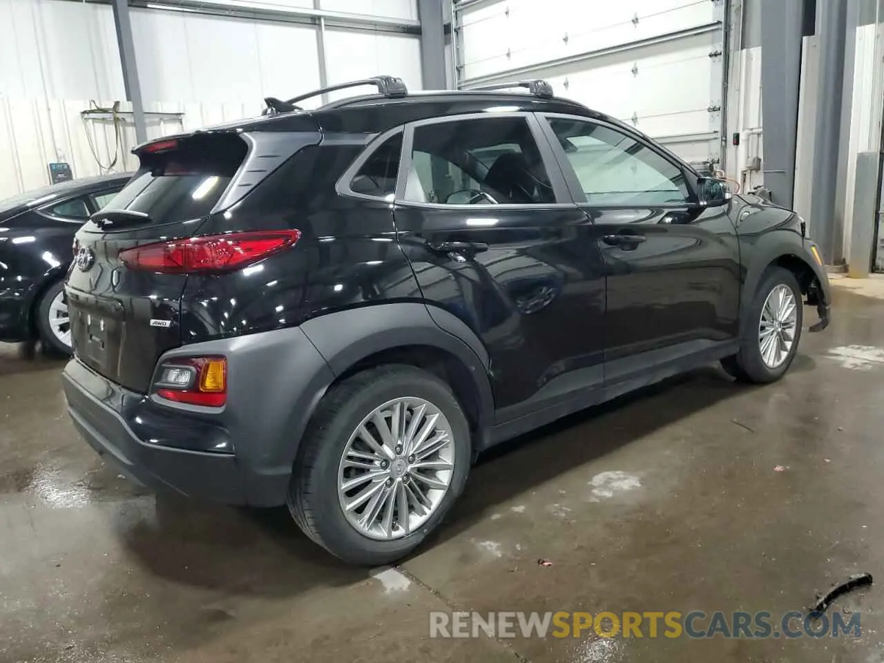 3 Photograph of a damaged car KM8K6CAA9MU704921 HYUNDAI KONA 2021