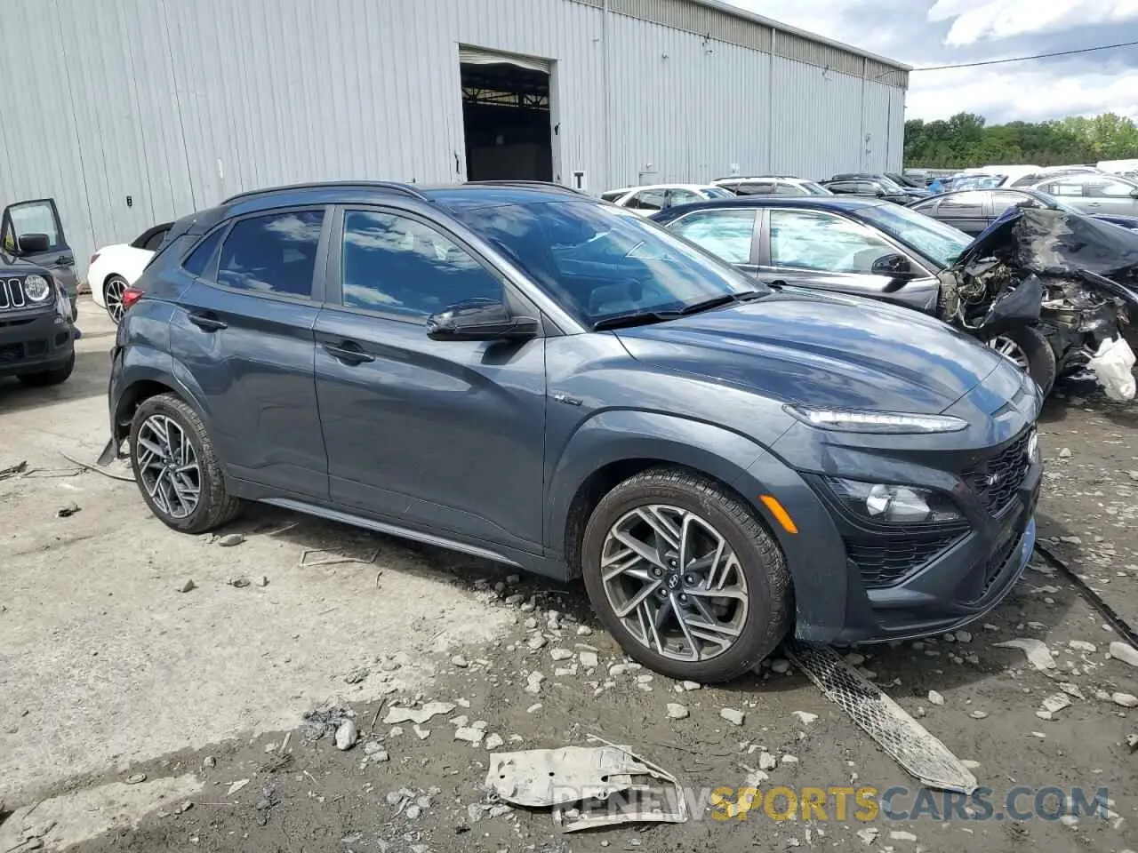 4 Photograph of a damaged car KM8K3CA39NU792882 HYUNDAI KONA 2022