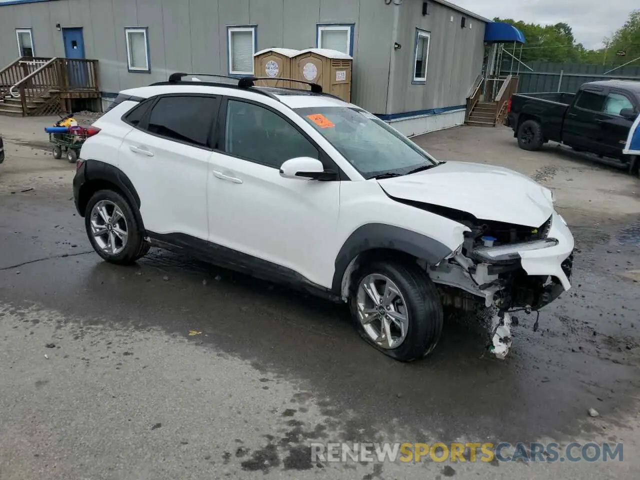 4 Photograph of a damaged car KM8K3CAB9NU786393 HYUNDAI KONA 2022