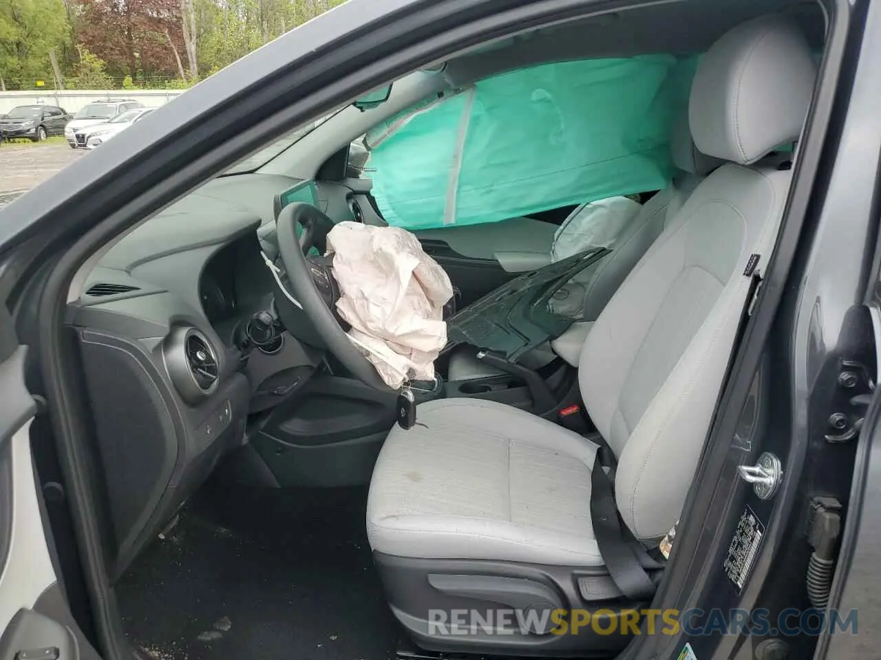 7 Photograph of a damaged car KM8K6CAB4NU928463 HYUNDAI KONA 2022
