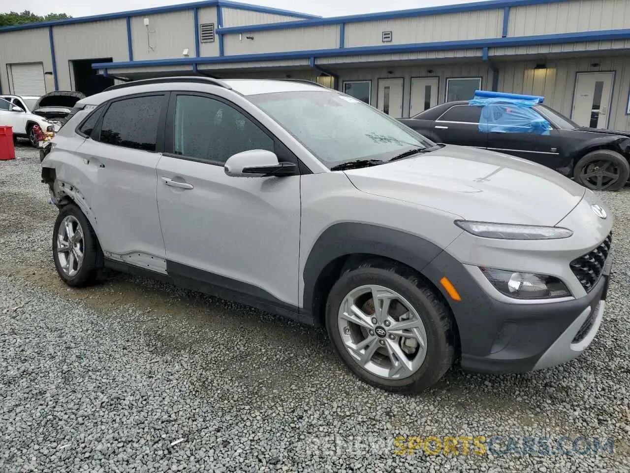 4 Photograph of a damaged car KM8K6CAB8NU795982 HYUNDAI KONA 2022