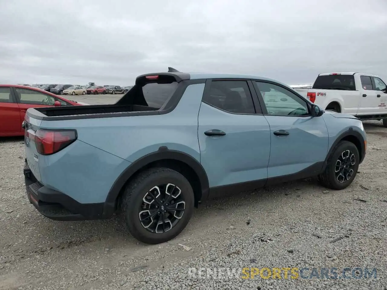 3 Photograph of a damaged car 5NTJADAE1NH025763 HYUNDAI SANTA CRUZ 2022