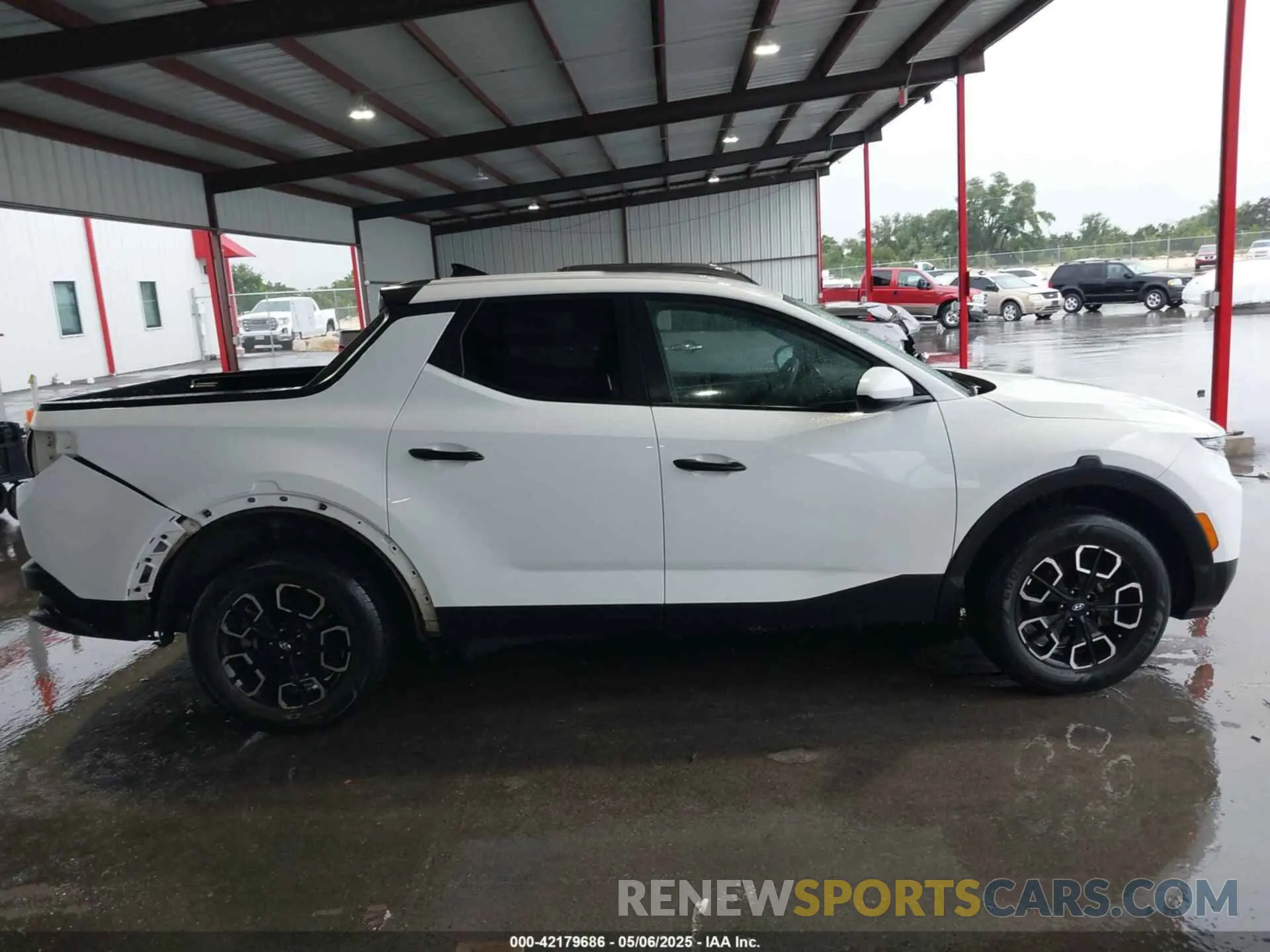 14 Photograph of a damaged car 5NTJADAE9NH028880 HYUNDAI SANTA CRUZ 2022