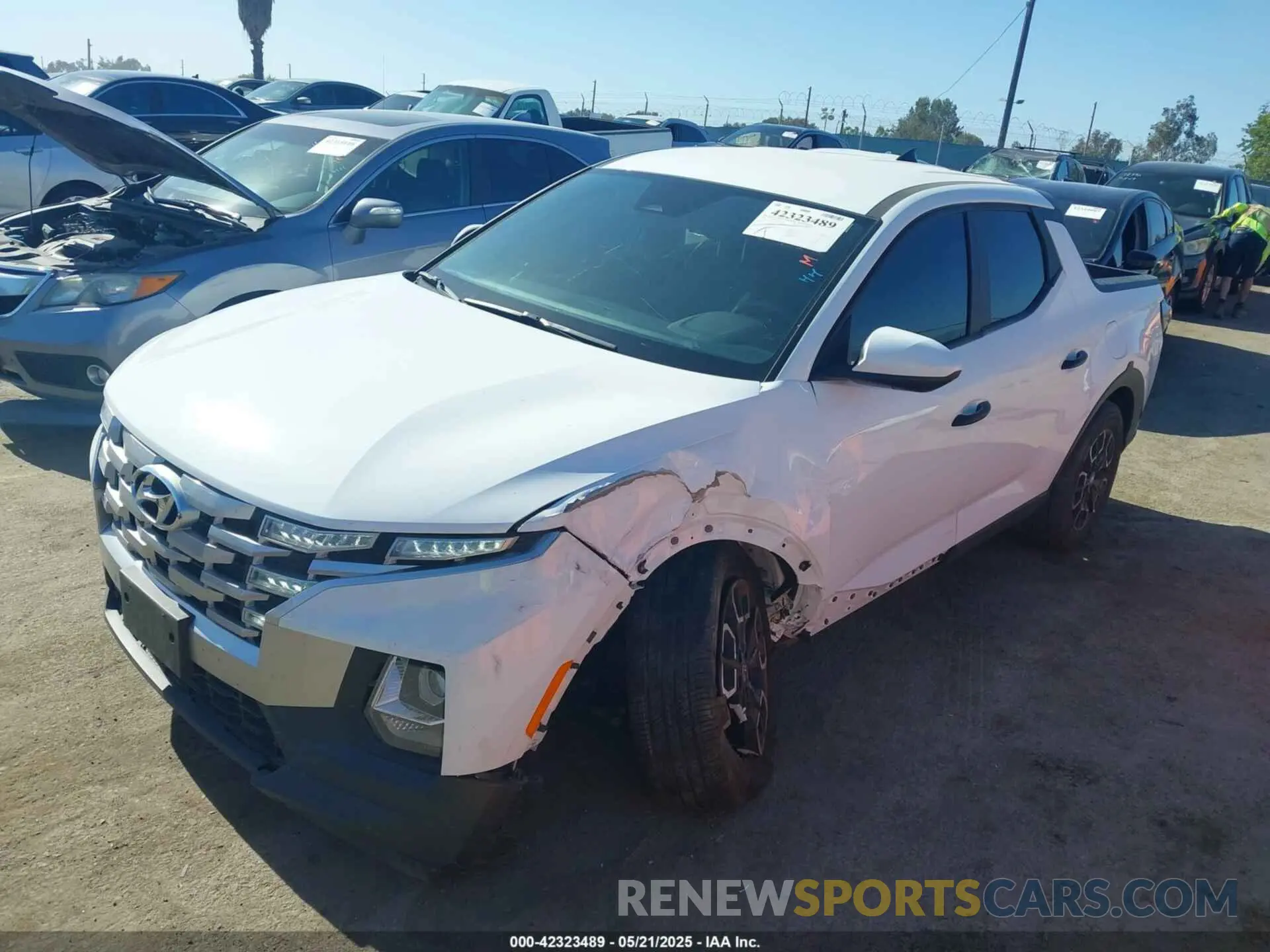 2 Photograph of a damaged car 5NTJADAEXNH023610 HYUNDAI SANTA CRUZ 2022