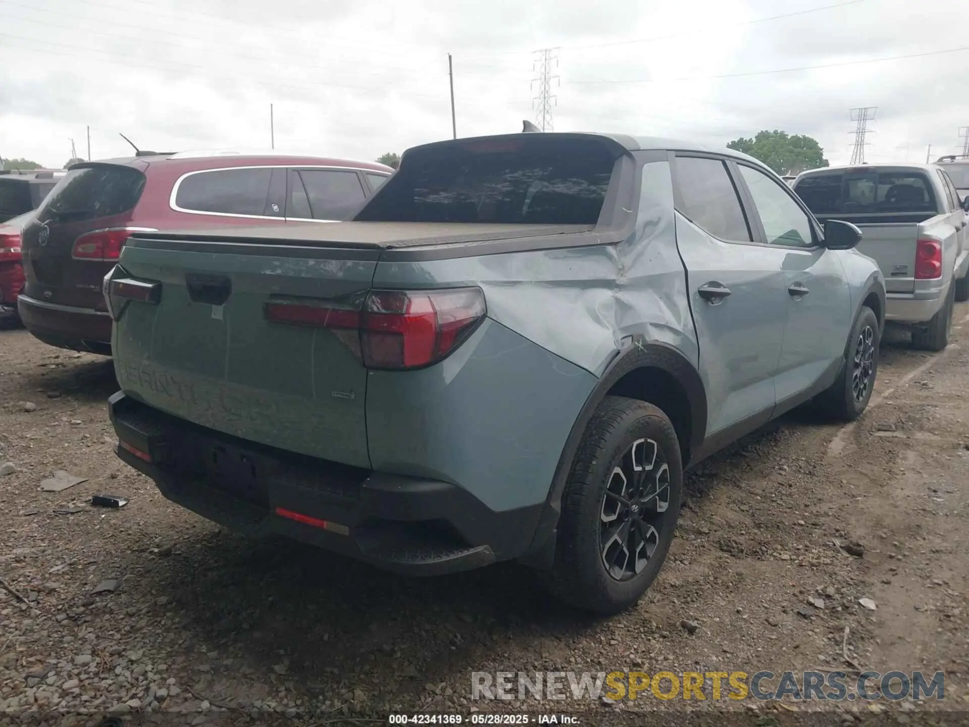 4 Photograph of a damaged car 5NTJBDAE9NH006973 HYUNDAI SANTA CRUZ 2022