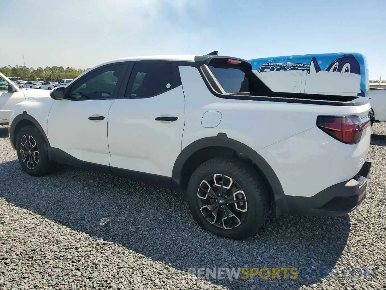 2 Photograph of a damaged car 5NTJBDAEXNH009686 HYUNDAI SANTA CRUZ 2022