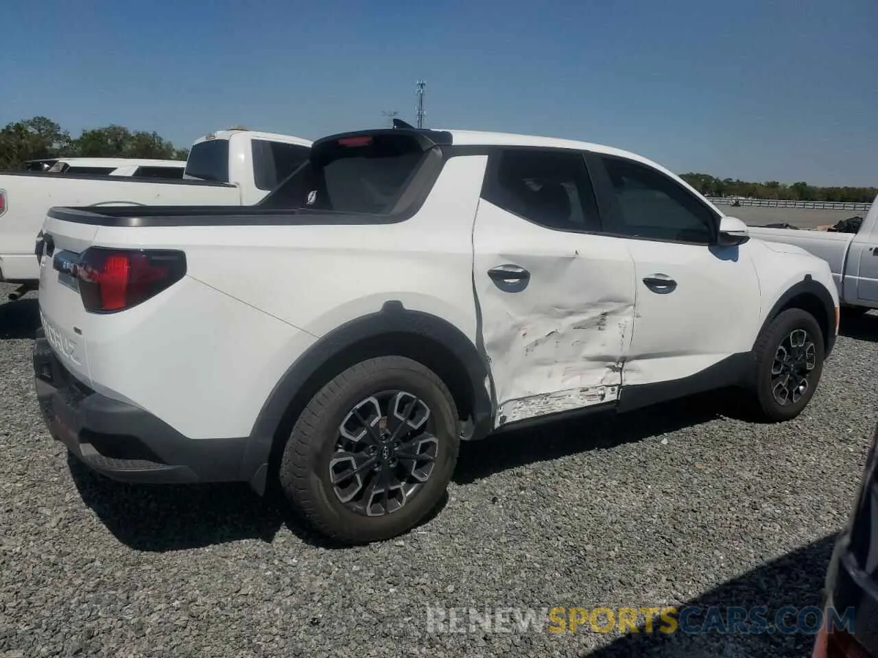 3 Photograph of a damaged car 5NTJBDAEXNH009686 HYUNDAI SANTA CRUZ 2022