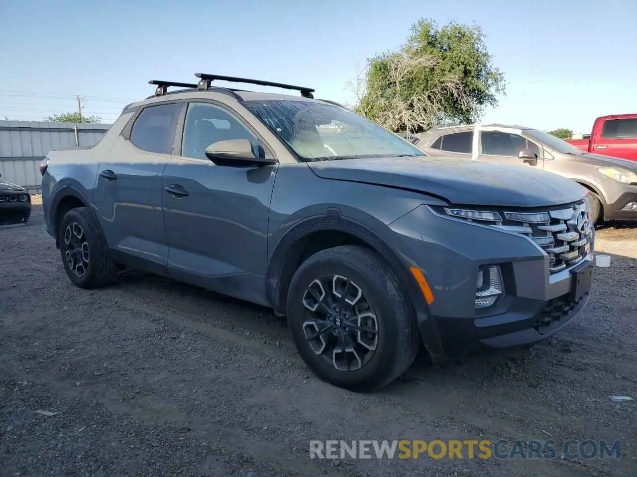 4 Photograph of a damaged car 5NTJCDAE0NH019768 HYUNDAI SANTA CRUZ 2022
