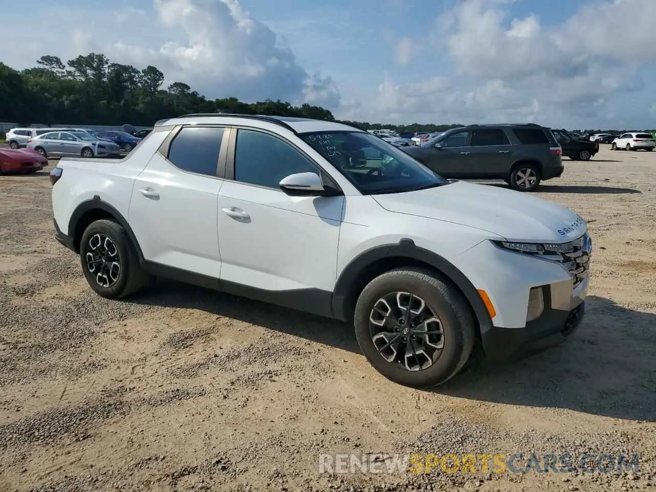 4 Photograph of a damaged car 5NTJDDAF0NH017475 HYUNDAI SANTA CRUZ 2022
