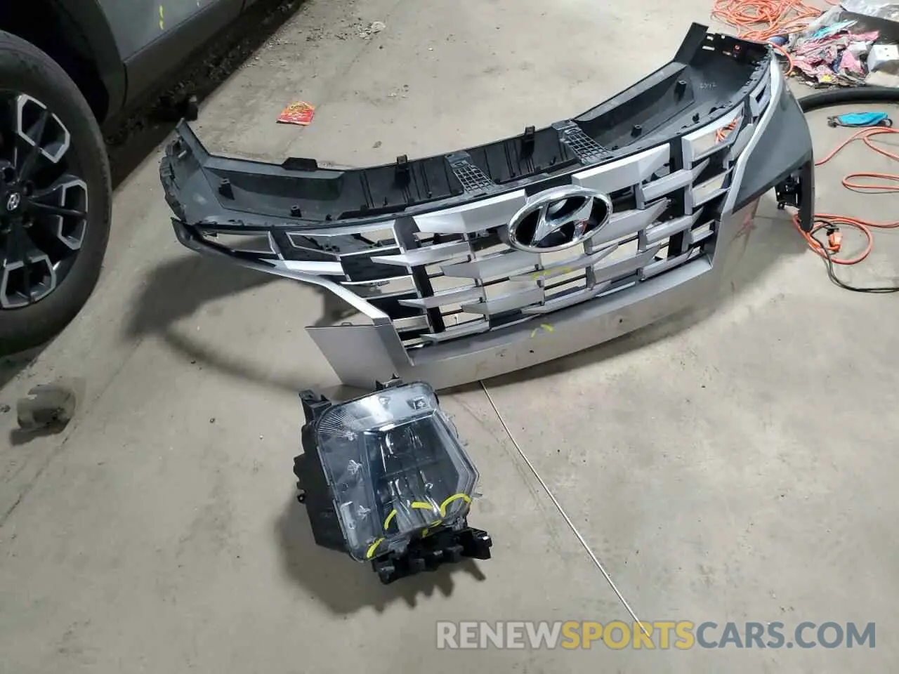 12 Photograph of a damaged car 5NTJDDAF4NH011324 HYUNDAI SANTA CRUZ 2022