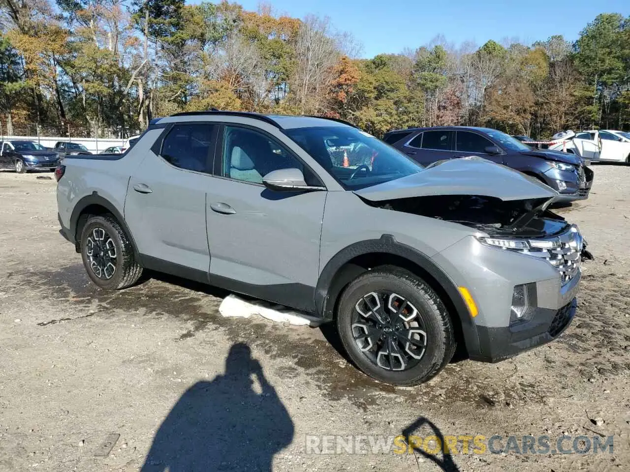 4 Photograph of a damaged car 5NTJDDAF7NH017134 HYUNDAI SANTA CRUZ 2022