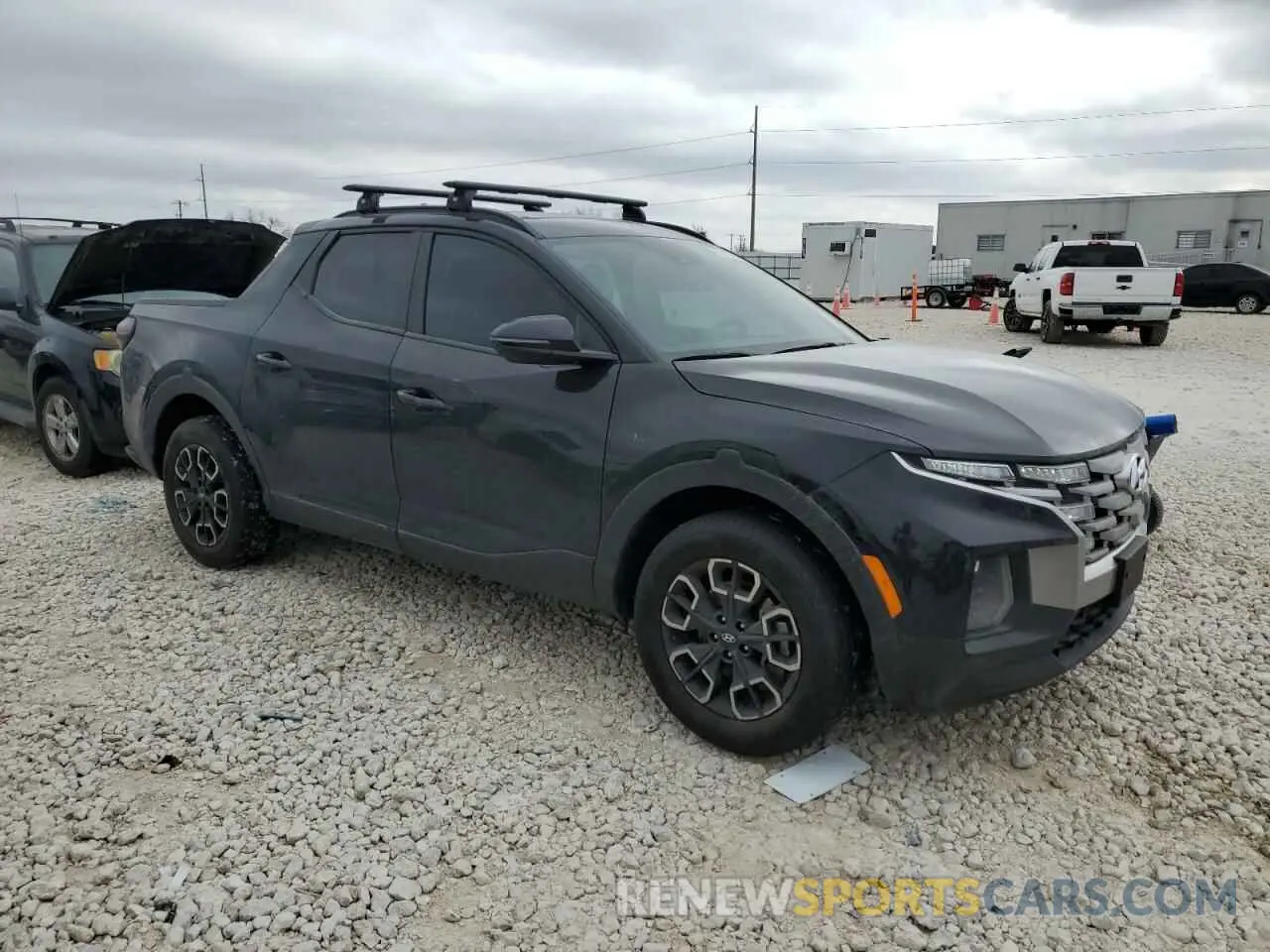 4 Photograph of a damaged car 5NTJDDAF7NH030210 HYUNDAI SANTA CRUZ 2022