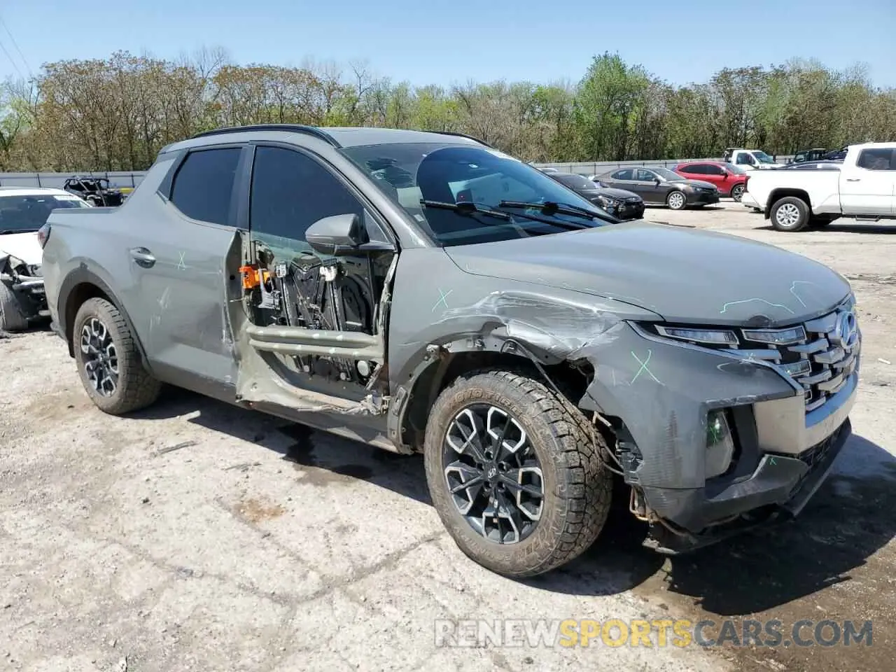 4 Photograph of a damaged car 5NTJDDAF9NH005339 HYUNDAI SANTA CRUZ 2022