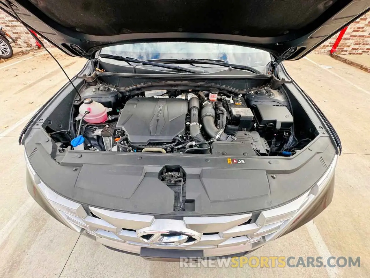 7 Photograph of a damaged car 5NTJDDAFXNH022277 HYUNDAI SANTA CRUZ 2022