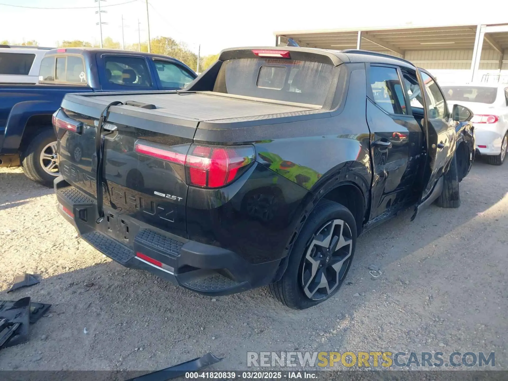 4 Photograph of a damaged car 5NTJEDAF0NH017411 HYUNDAI SANTA CRUZ 2022