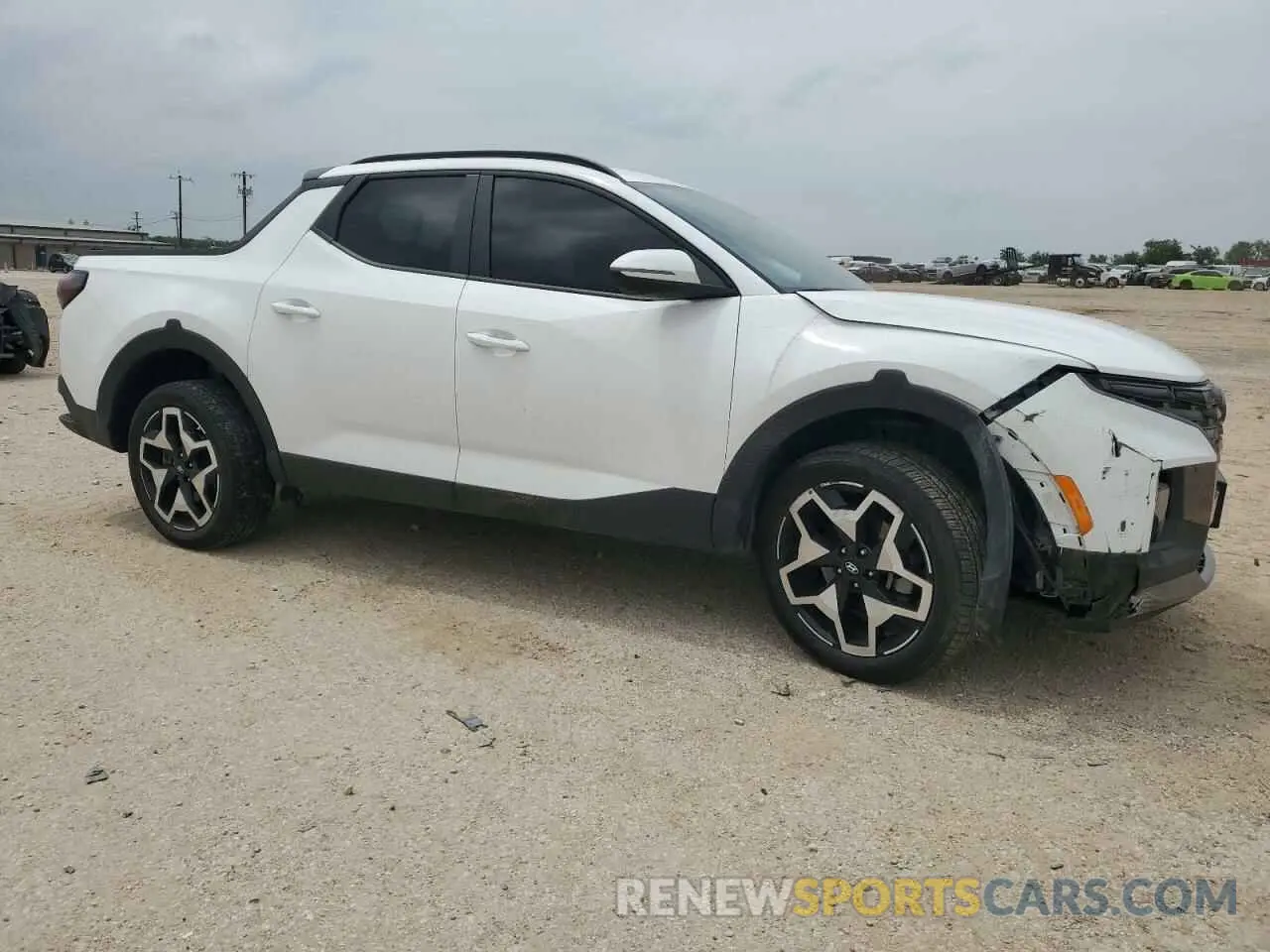 4 Photograph of a damaged car 5NTJEDAF1NH023234 HYUNDAI SANTA CRUZ 2022