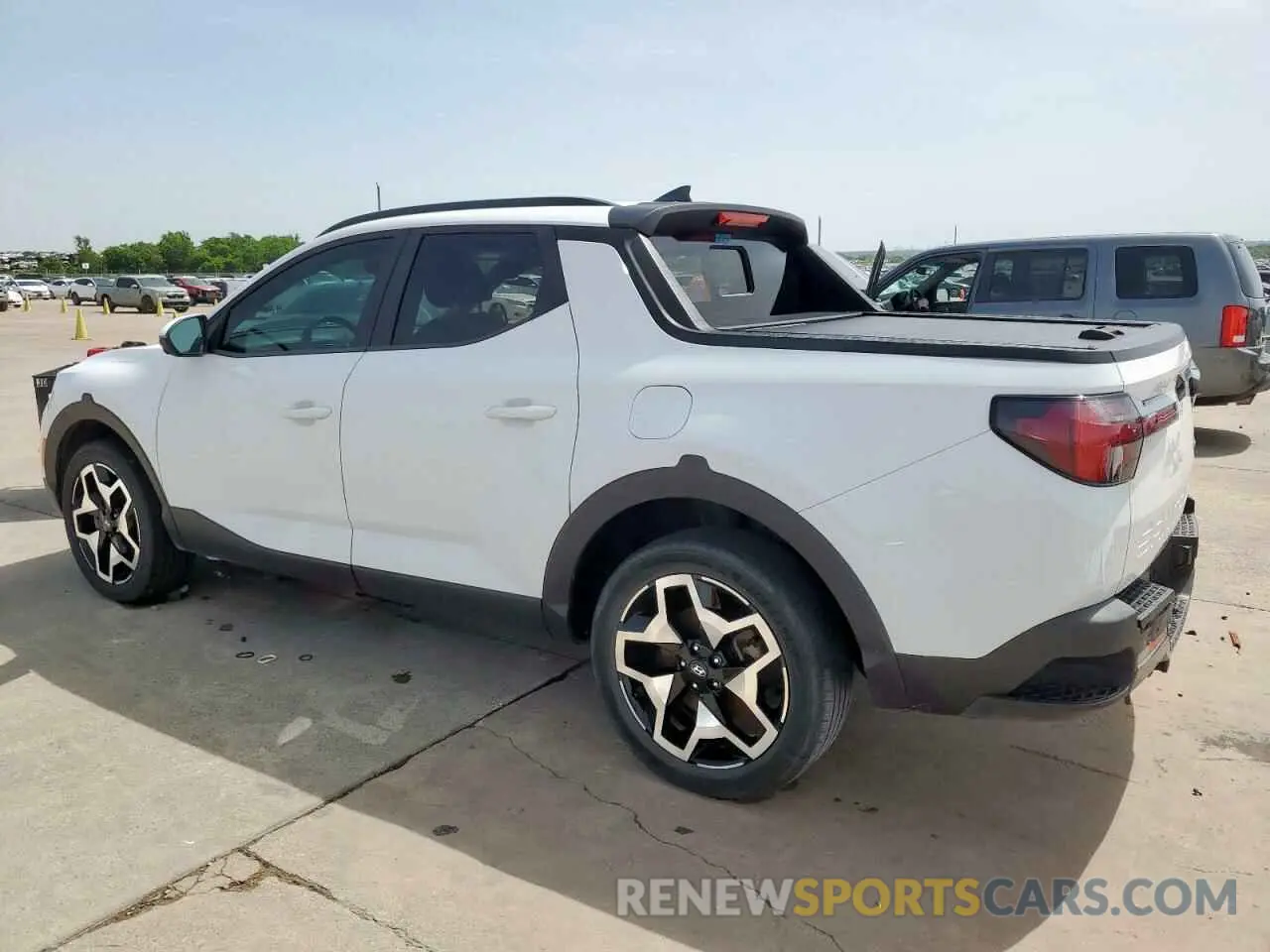 2 Photograph of a damaged car 5NTJEDAF2NH016003 HYUNDAI SANTA CRUZ 2022