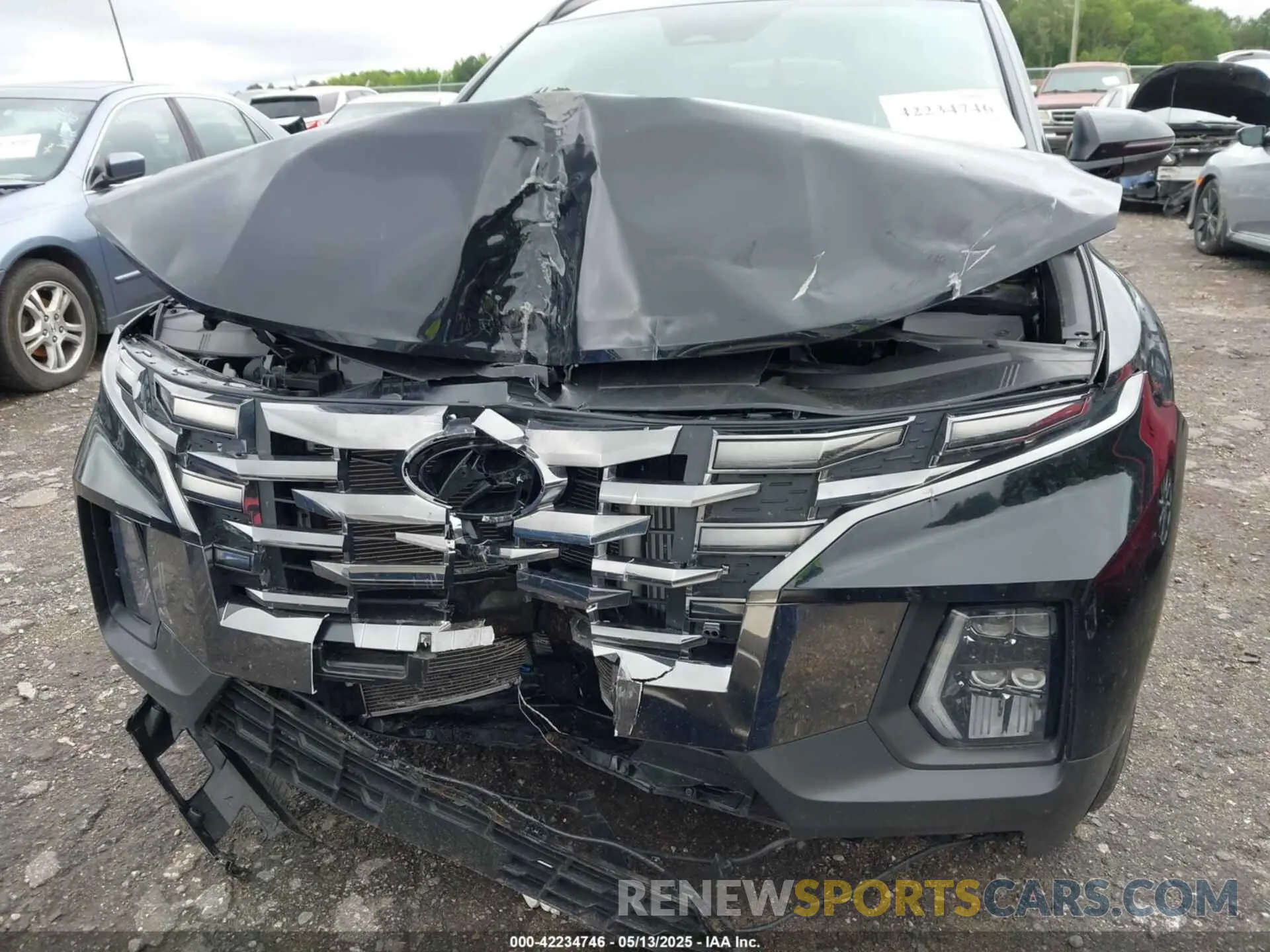 12 Photograph of a damaged car 5NTJEDAF3NH010999 HYUNDAI SANTA CRUZ 2022