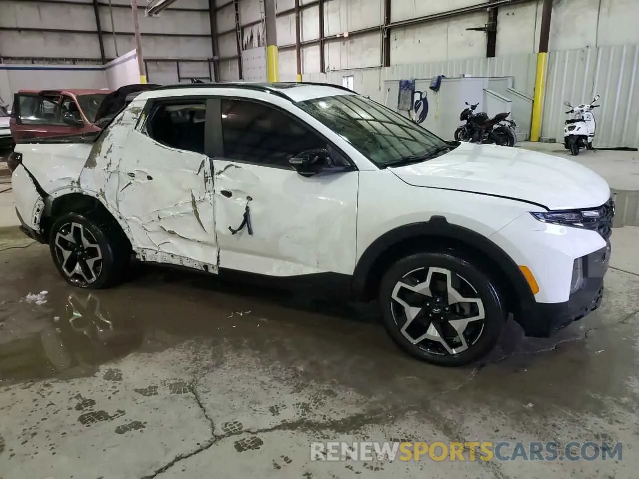 4 Photograph of a damaged car 5NTJEDAF4NH010798 HYUNDAI SANTA CRUZ 2022