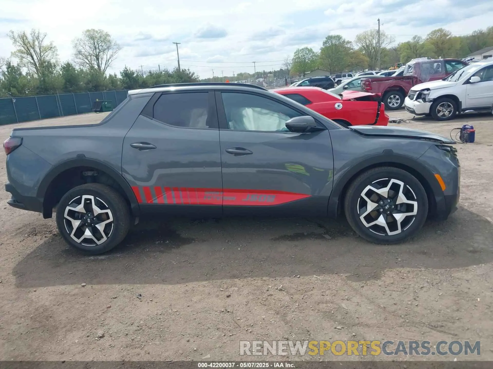 12 Photograph of a damaged car 5NTJEDAF5NH012737 HYUNDAI SANTA CRUZ 2022