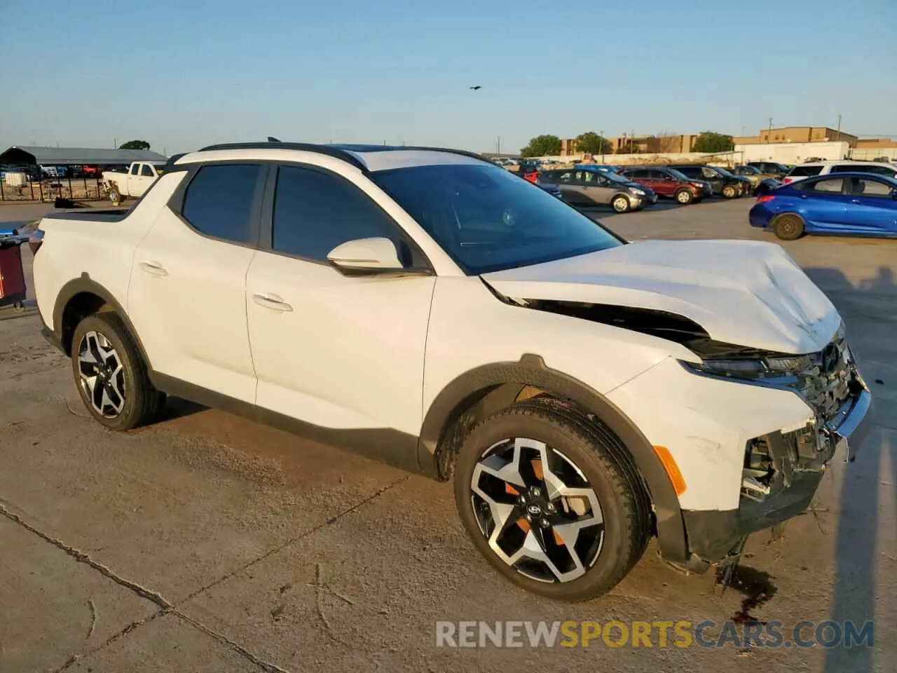 4 Photograph of a damaged car 5NTJEDAF8NH002221 HYUNDAI SANTA CRUZ 2022