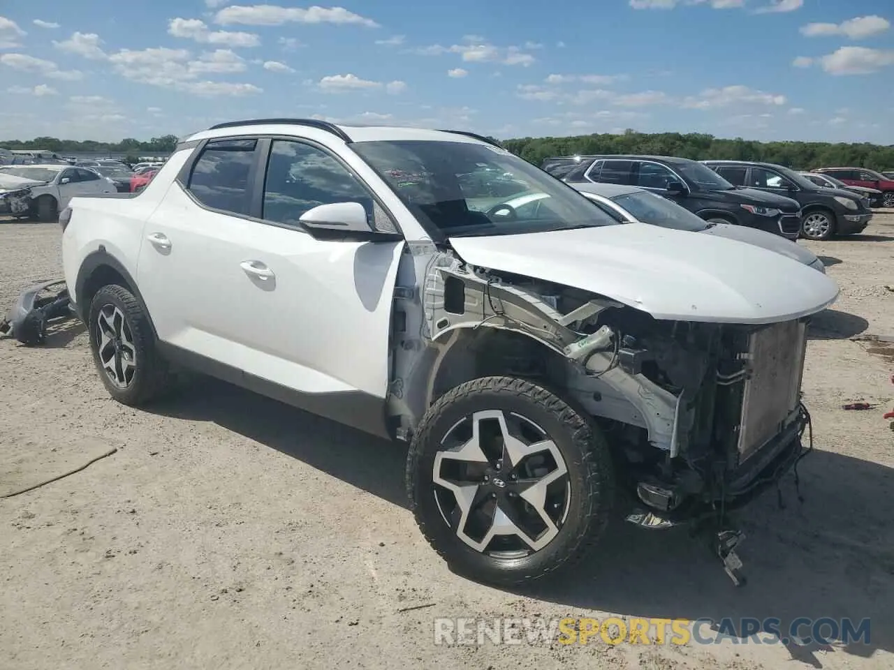 4 Photograph of a damaged car 5NTJEDAF9NH033350 HYUNDAI SANTA CRUZ 2022