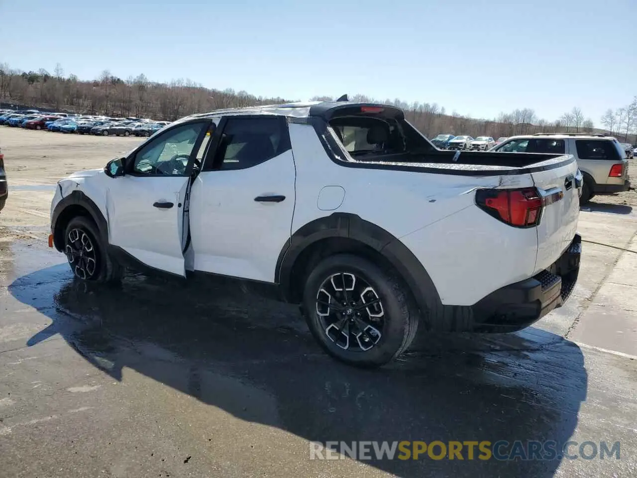 2 Photograph of a damaged car 5NTJBDAE5PH076411 HYUNDAI SANTA CRUZ 2023