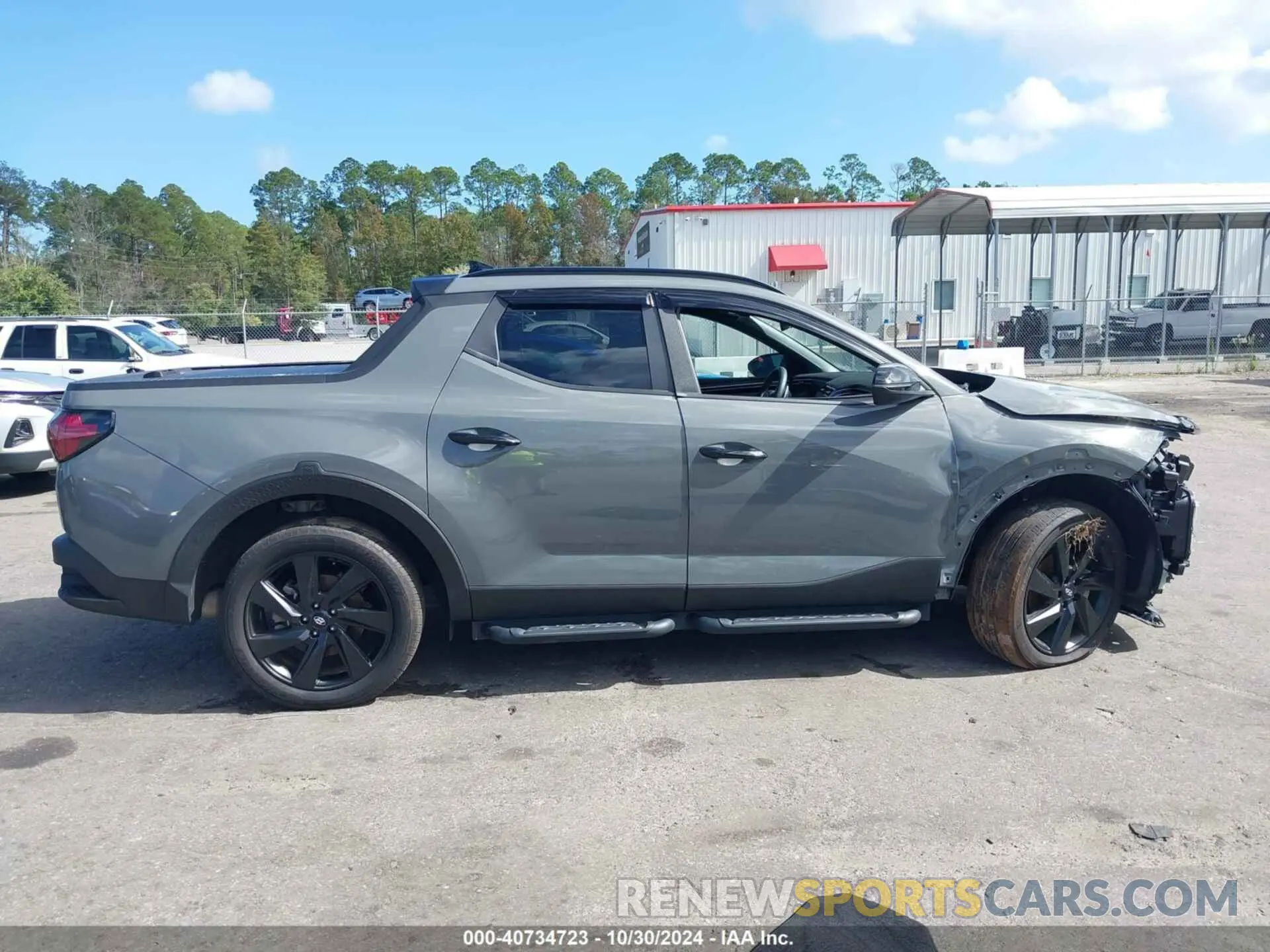 14 Photograph of a damaged car 5NTJCDAF0PH054192 HYUNDAI SANTA CRUZ 2023
