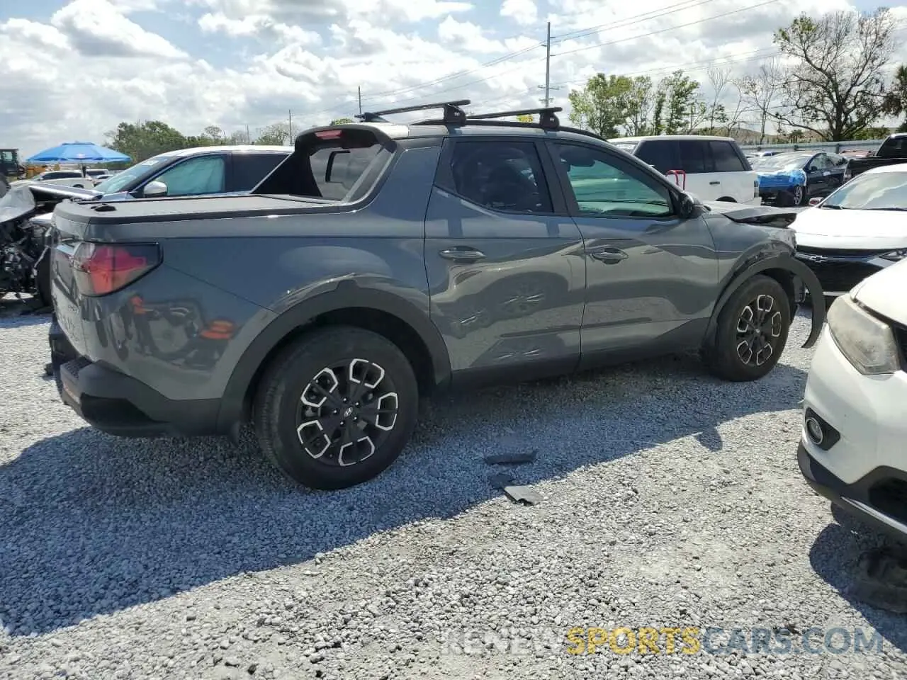 3 Photograph of a damaged car 5NTJDDAF1PH041643 HYUNDAI SANTA CRUZ 2023