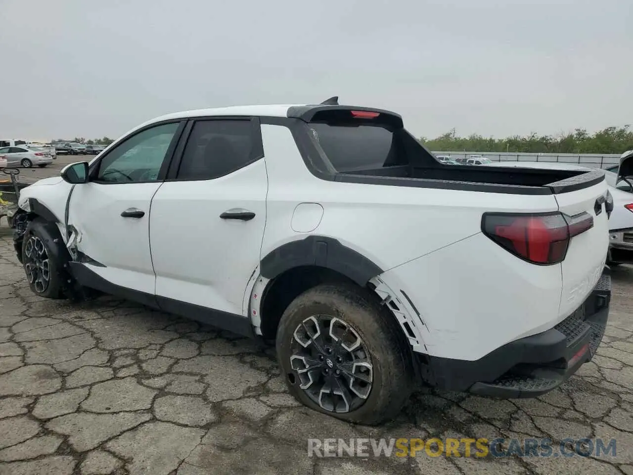 2 Photograph of a damaged car 5NTJBDDE7RH103106 HYUNDAI SANTA CRUZ 2024