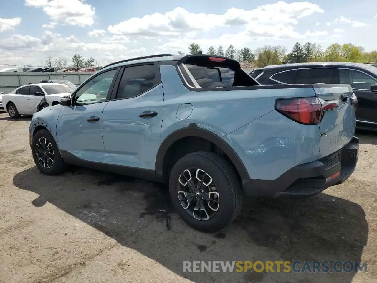 2 Photograph of a damaged car 5NTJCDDE4RH105120 HYUNDAI SANTA CRUZ 2024