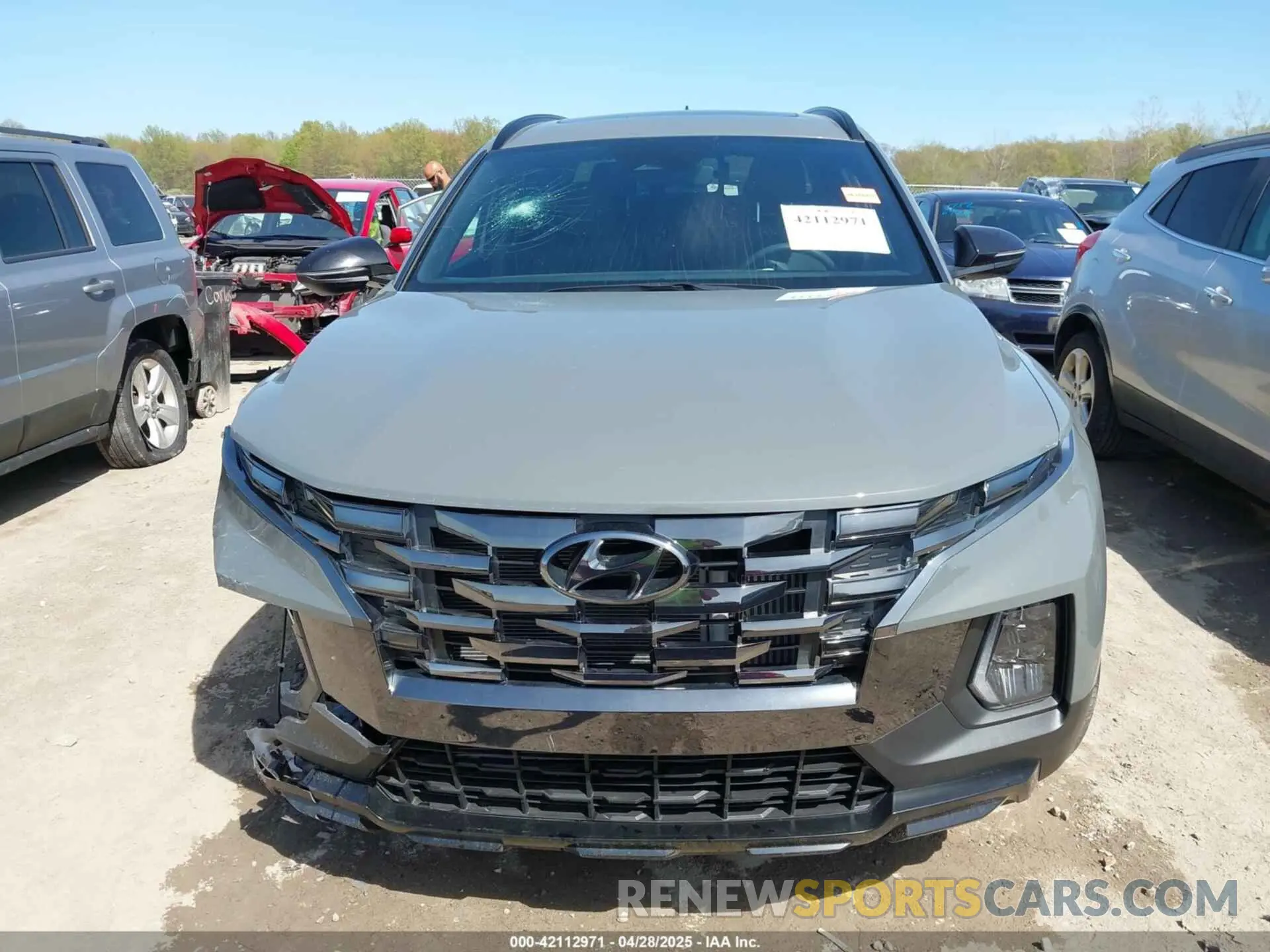 12 Photograph of a damaged car 5NTJCDDF6RH114667 HYUNDAI SANTA CRUZ 2024