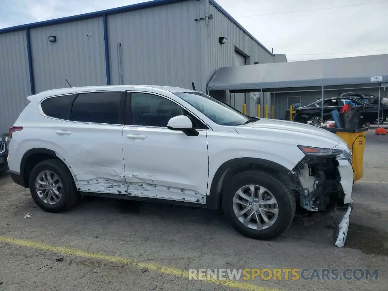 4 Photograph of a damaged car 5NMS23AD2KH100402 HYUNDAI SANTA FE 2019