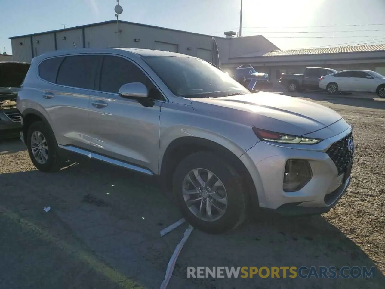 4 Photograph of a damaged car 5NMS23AD4KH076930 HYUNDAI SANTA FE 2019