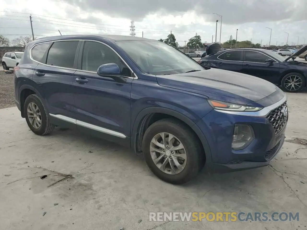 4 Photograph of a damaged car 5NMS23AD5KH128369 HYUNDAI SANTA FE 2019