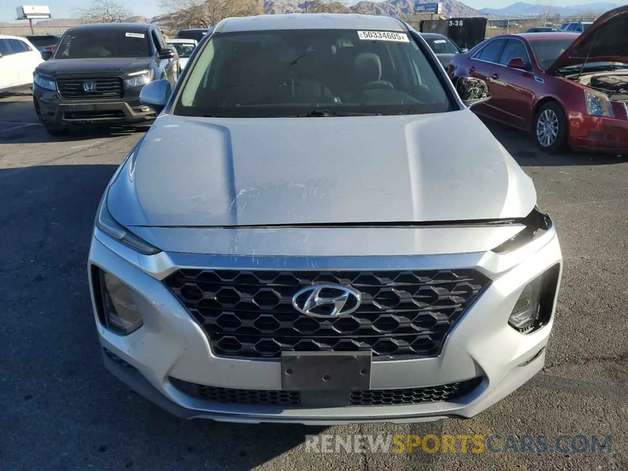5 Photograph of a damaged car 5NMS23AD7KH064707 HYUNDAI SANTA FE 2019