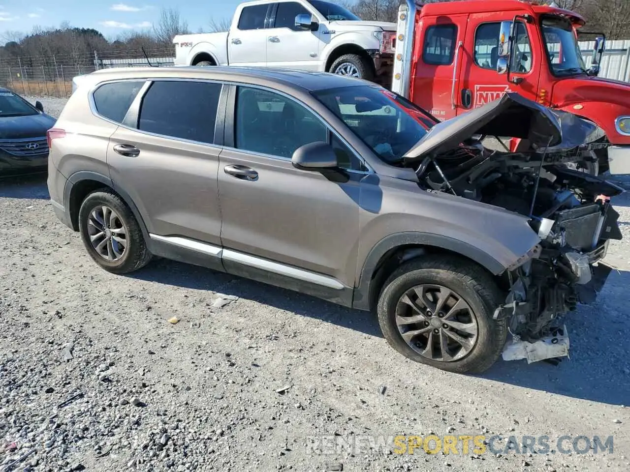 4 Photograph of a damaged car 5NMS23AD9KH023222 HYUNDAI SANTA FE 2019