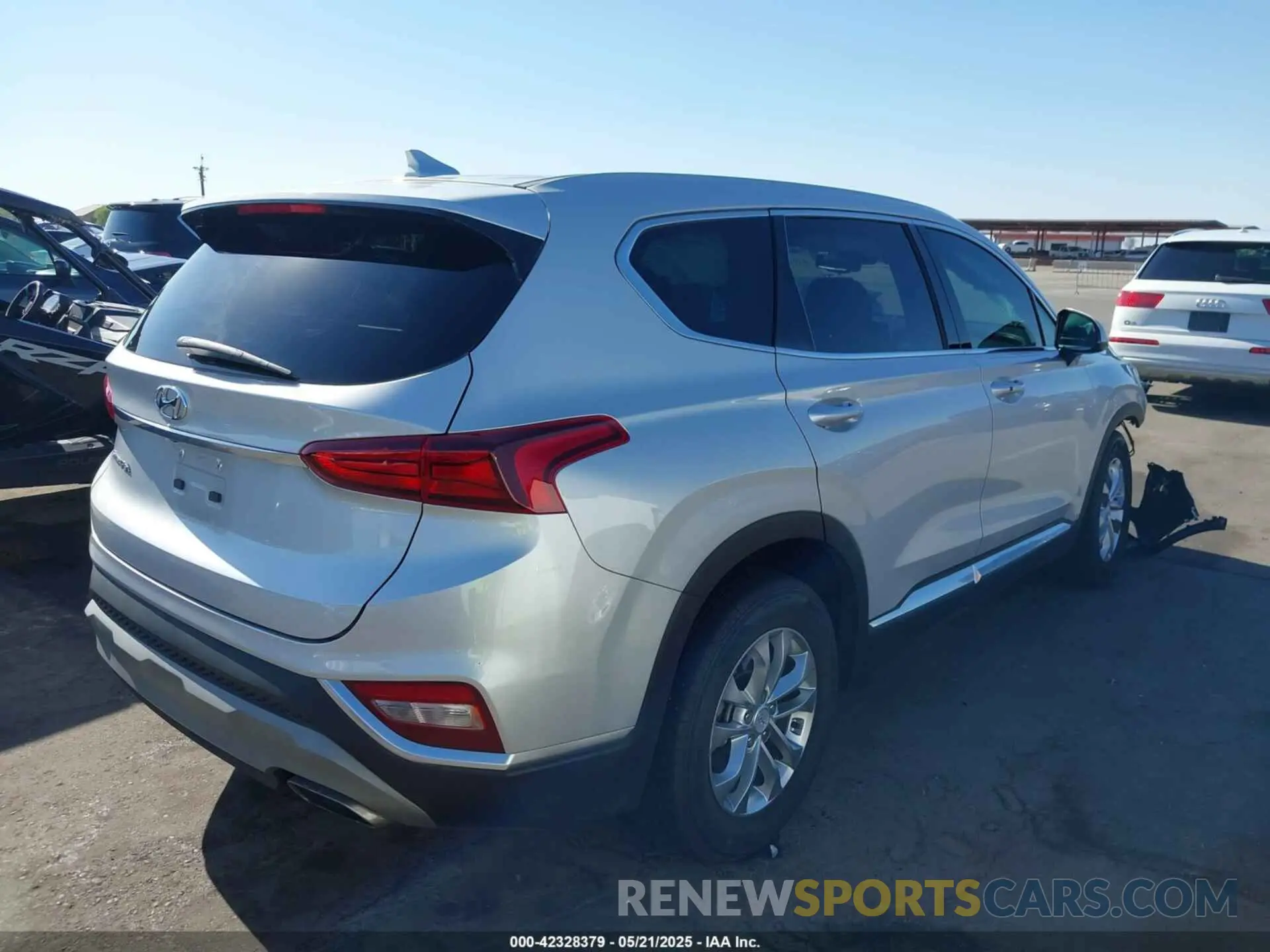 4 Photograph of a damaged car 5NMS33AD2KH130111 HYUNDAI SANTA FE 2019