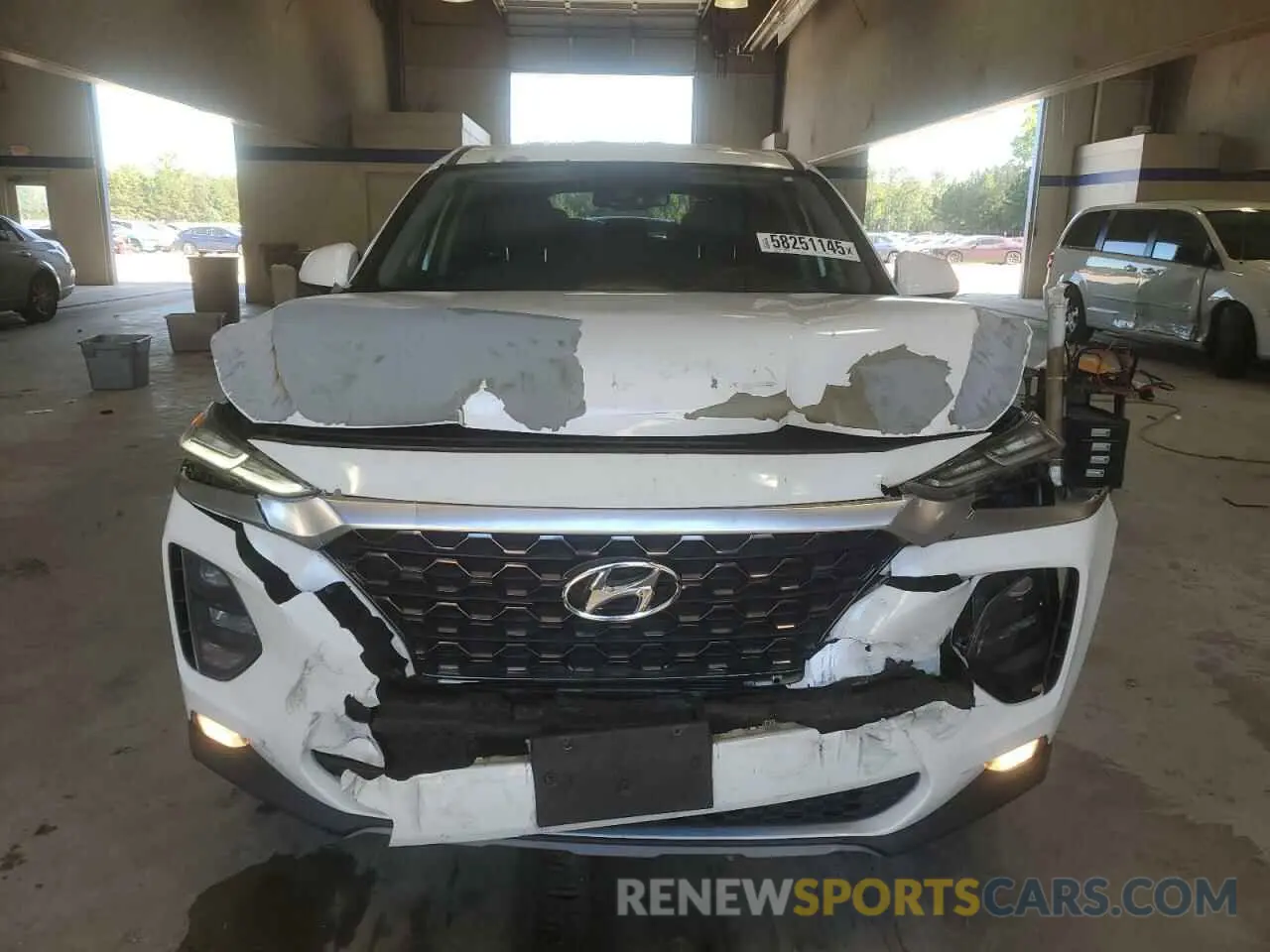 5 Photograph of a damaged car 5NMS33AD3KH004579 HYUNDAI SANTA FE 2019