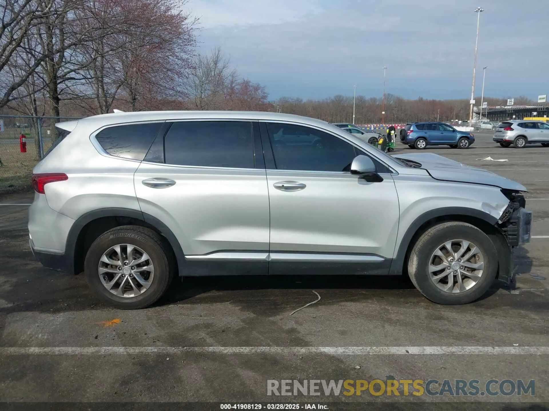 12 Photograph of a damaged car 5NMS3CAD9KH064284 HYUNDAI SANTA FE 2019