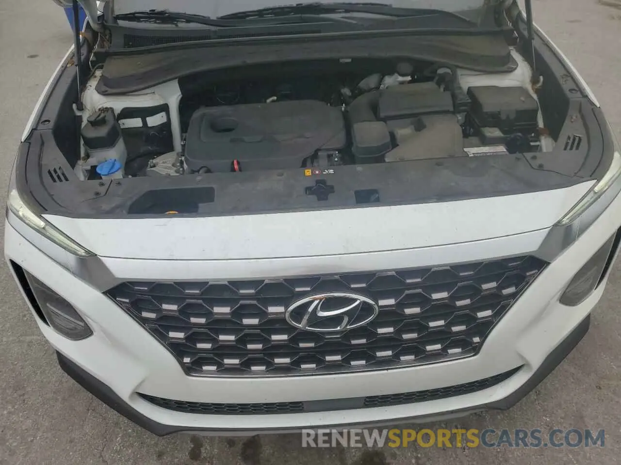 12 Photograph of a damaged car 5NMS53AD4KH059858 HYUNDAI SANTA FE 2019