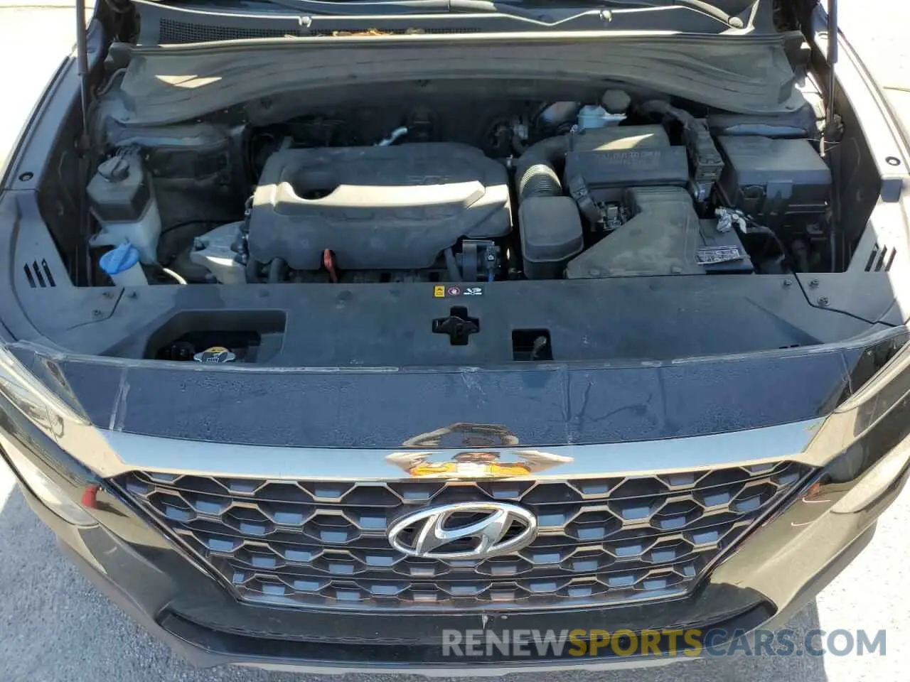 12 Photograph of a damaged car 5NMS53AD5KH010409 HYUNDAI SANTA FE 2019