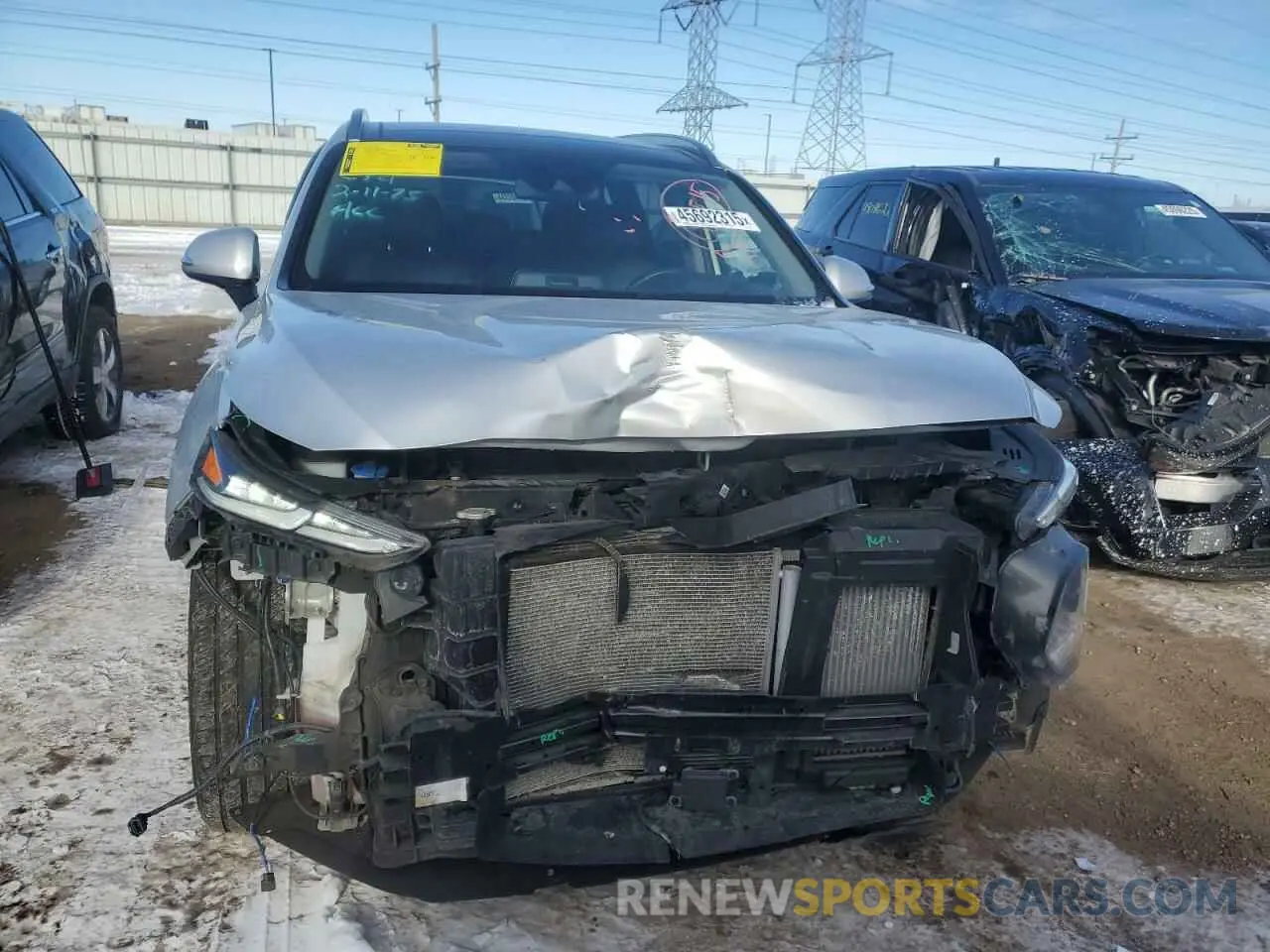 5 Photograph of a damaged car 5NMS5CAA2KH028243 HYUNDAI SANTA FE 2019