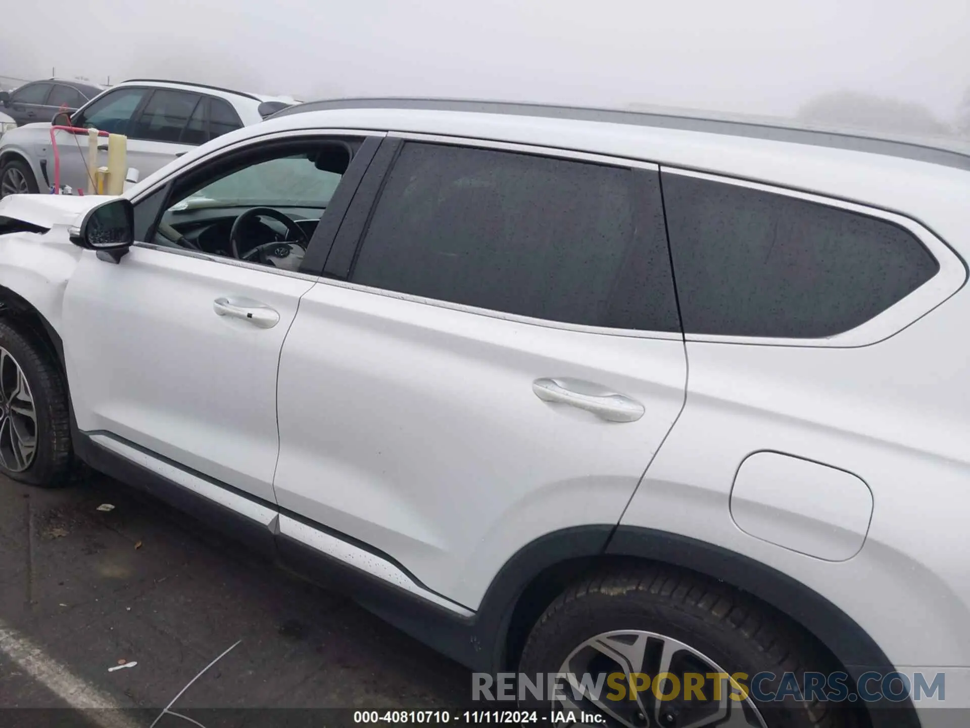 14 Photograph of a damaged car 5NMS5CAA3KH036089 HYUNDAI SANTA FE 2019