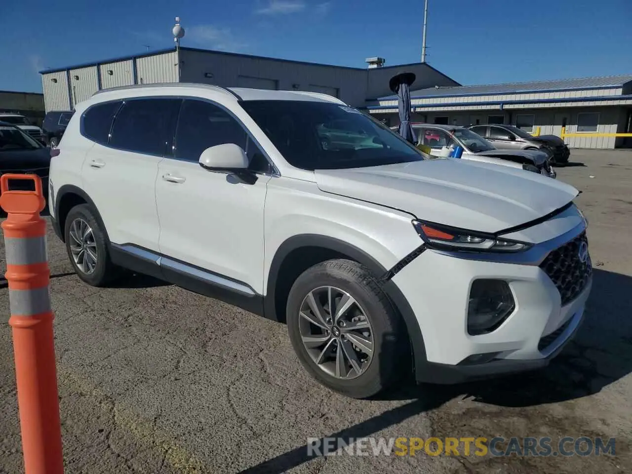 4 Photograph of a damaged car 5NMS33AD9LH202763 HYUNDAI SANTA FE 2020